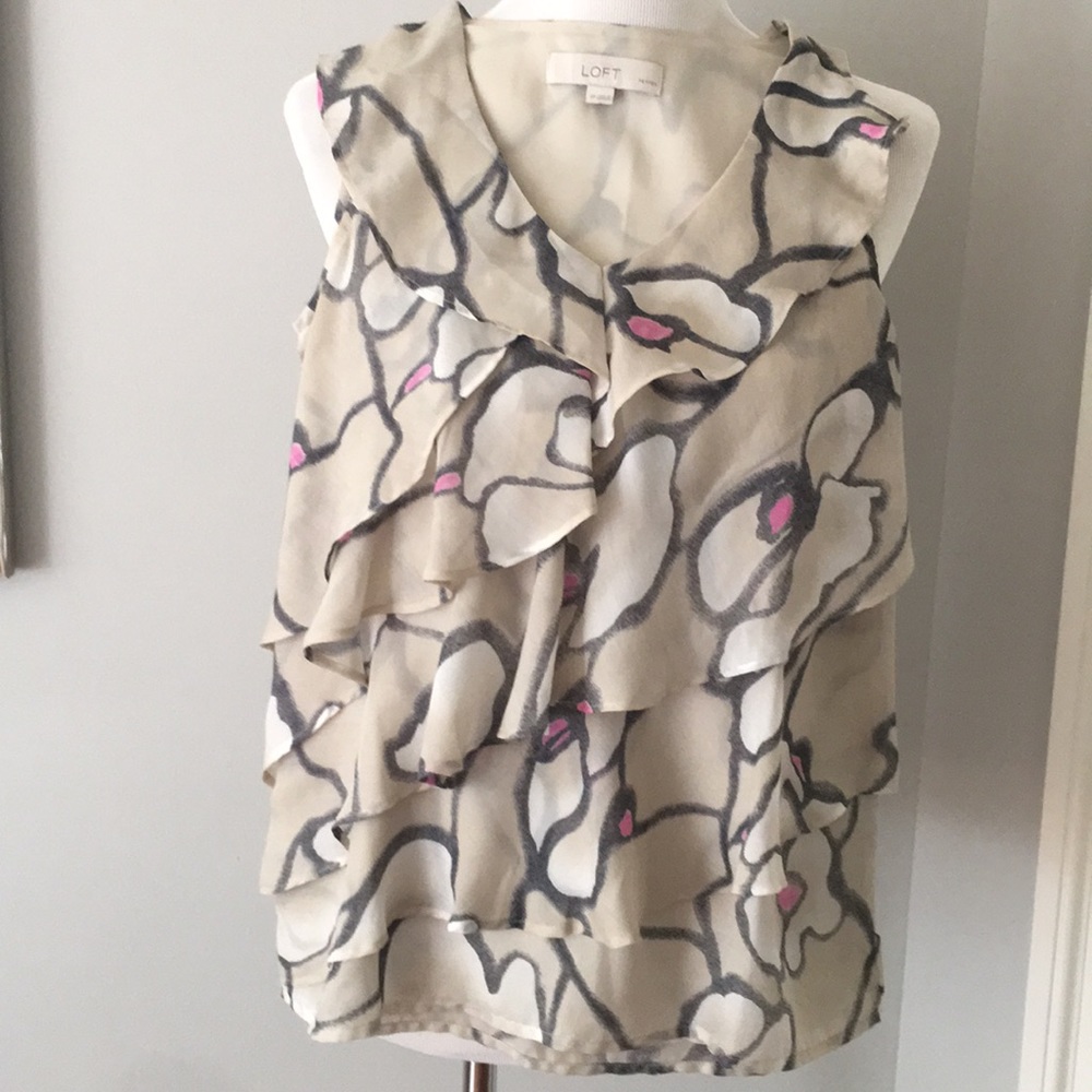 Ladies ruffled sleeveless blouse
